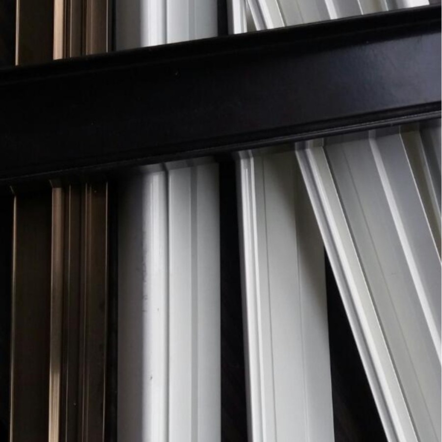 EXTRUDED AND ANODIZED ALUMINIUM PROFILE SECTIONS